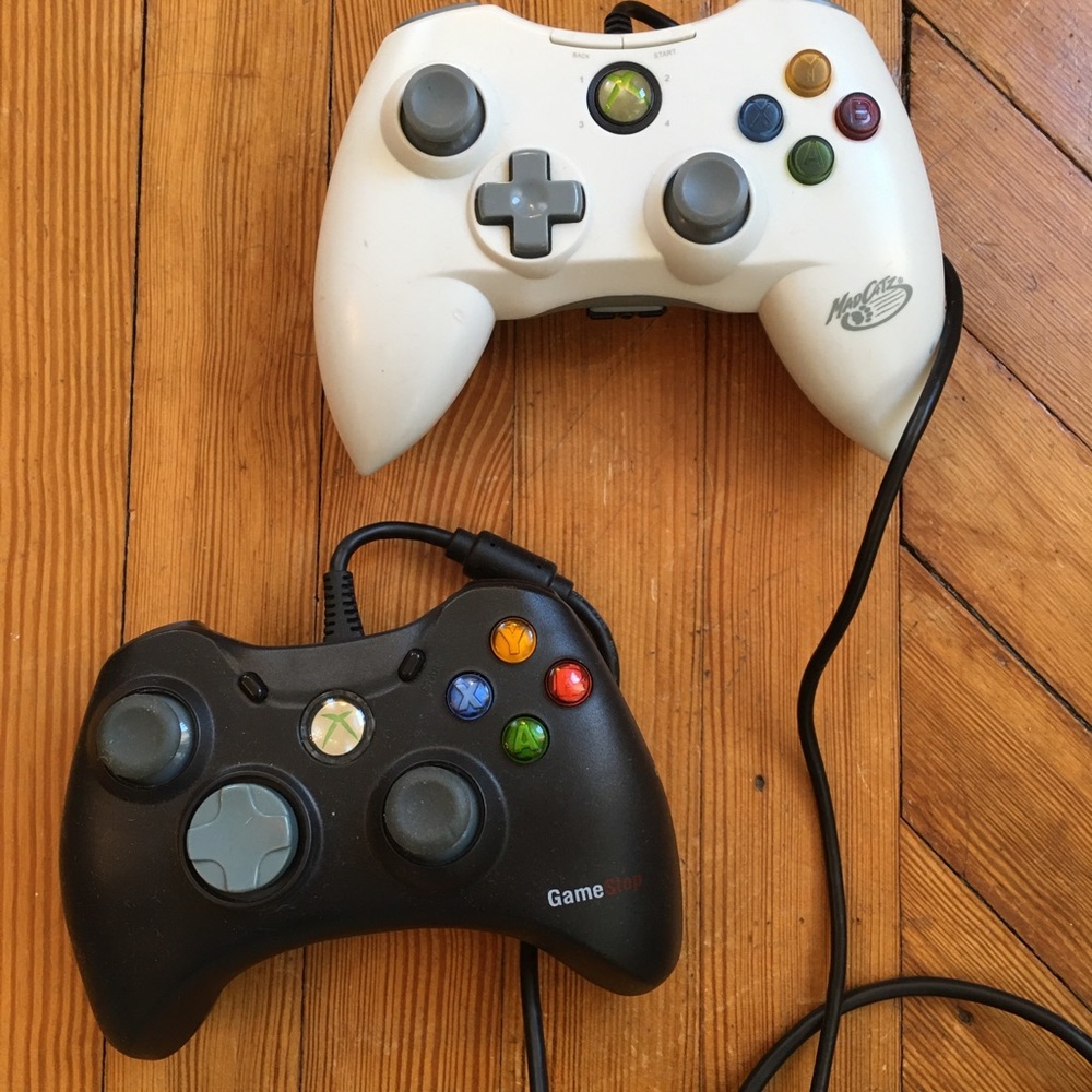 Game Stop Mad Cath lot of 2 controllers.